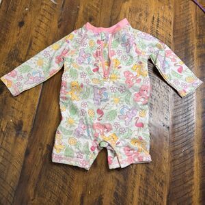 Care bear swim romper  6/9 months